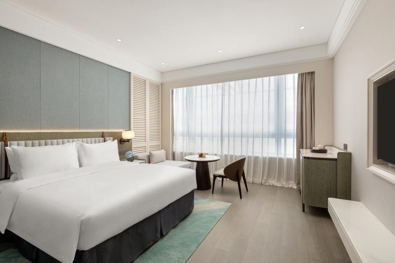 Xiamen International Seaside Hotel -Hotel Corridor Leads To The Stone Exhibition Hall Екстер'єр фото