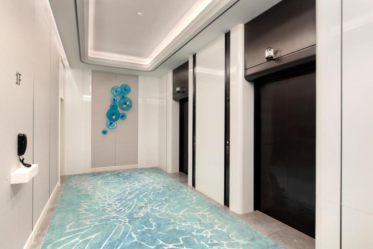 Xiamen International Seaside Hotel -Hotel Corridor Leads To The Stone Exhibition Hall Екстер'єр фото
