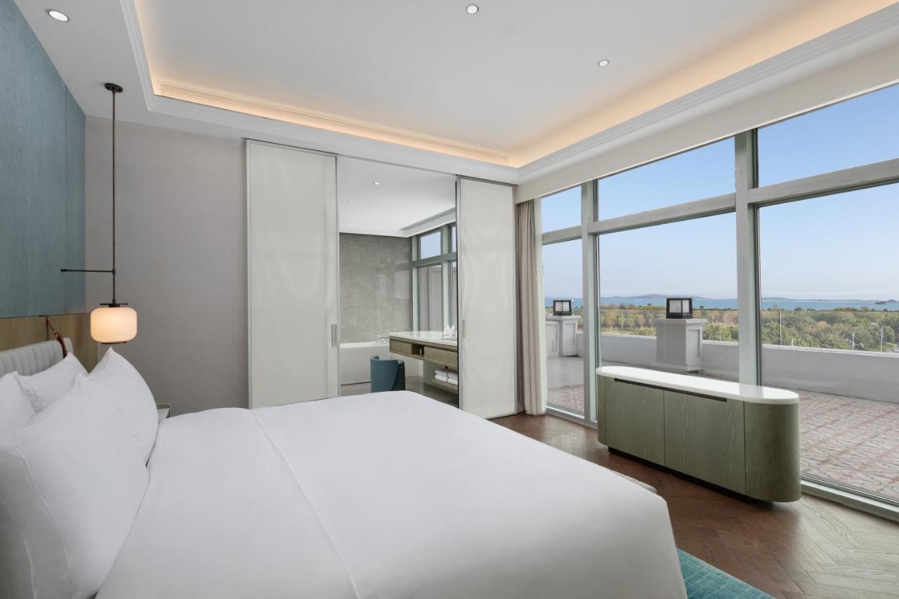Xiamen International Seaside Hotel -Hotel Corridor Leads To The Stone Exhibition Hall Екстер'єр фото